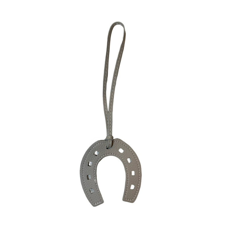Horseshoe Leather Bag Charm – A Symbol of Style and Luck
